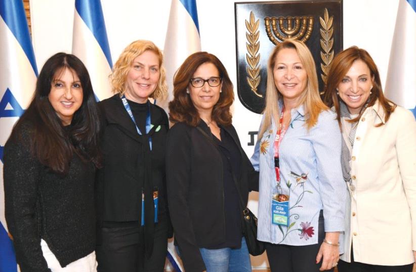 MEMBERS OF an all-female delegation of the Friends of the IDF, who visited Israel for International Women’s Day, pose for a picture. From left: Sylvia Stark, Sharon Miskin, Rachel Fine, retired Brig.-Gen. Gila Klifi-Amir and Marcy Gringlas. (photo credit: SHAHAR AZRAN)