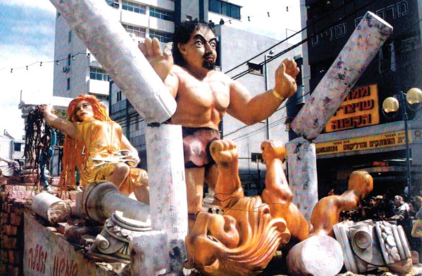 The story of Samson and Delilah enjoys pride of place in a biblically themed parade float (photo credit: ELI NEEMAN)