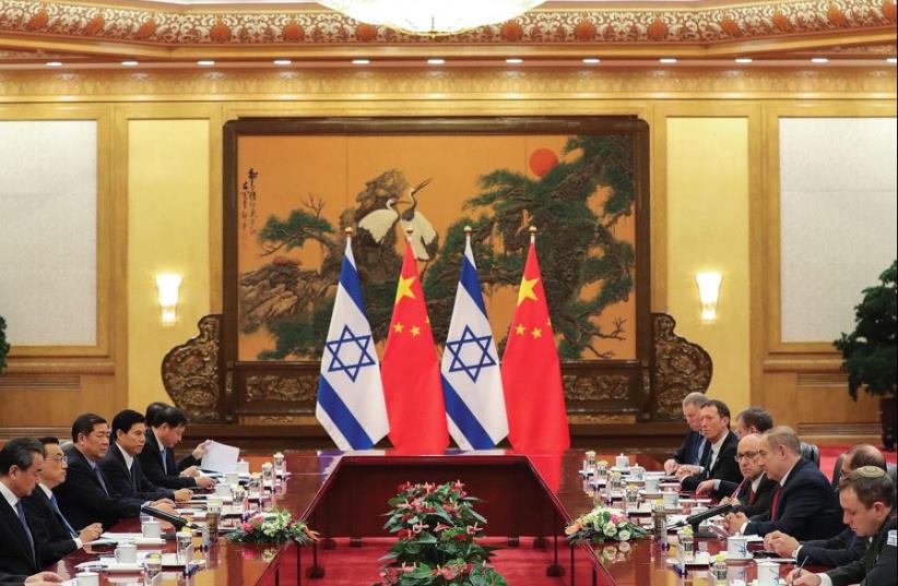 CHINESE AND ISRAELI officials meet at the Great Hall of the People on Monday in Beijing. Israeli businessmen who accompanied the delegation reportedly signed deals worth some NIS 7.3b (photo credit: REUTERS)