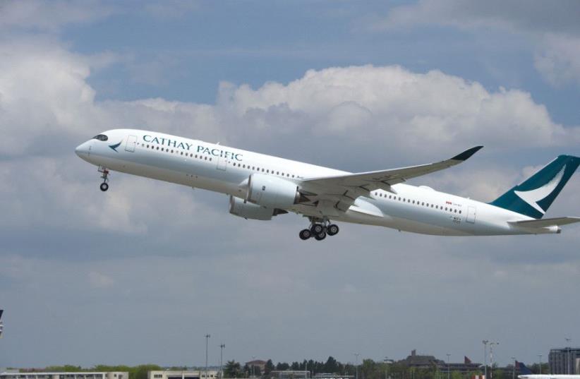 Cathay Pacific aeroplane (photo credit: CATHAY PACIFIC)