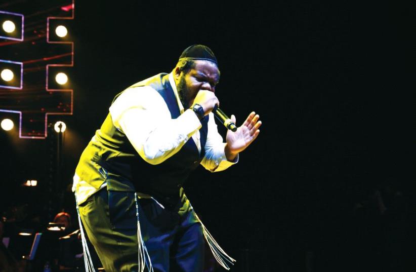 Rapper Nissim Black performs in a concert (photo credit: SHIMI KUTNER)