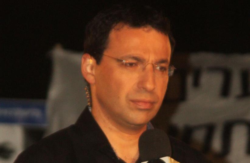 Raviv Drucker (photo credit: IDOBI/WIKIMEDIA)
