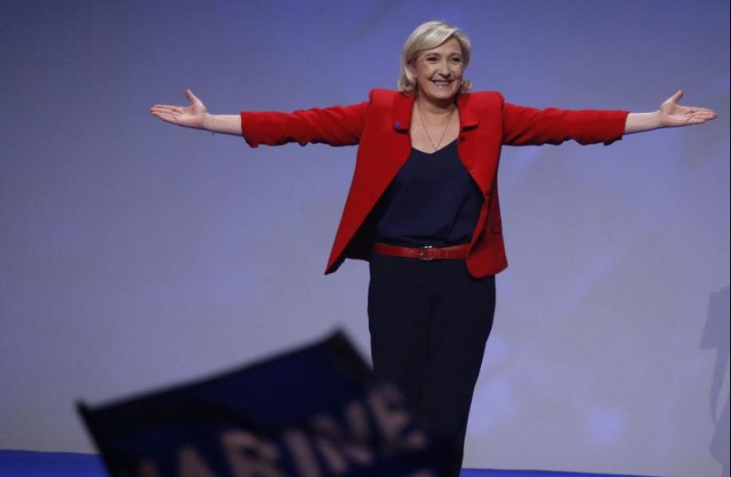 Marine Le Pen, French National Front (FN) political party leader and candidate for French 2017 presidential election, attends a campaign rally in Paris, France, April 17, 2017 (photo credit: REUTERS)