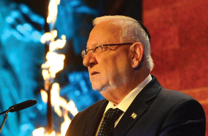 PRESIDENT REUVEN RIVLIN addresses the Holocaust Remembrance Day opening ceremony at Yad Vashem on Sunday (photo credit: MARC ISRAEL SELLEM)