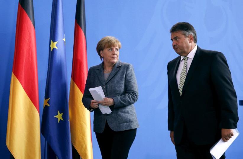Angela Merkel and Sigmar Gabriel. (photo credit: REUTERS)