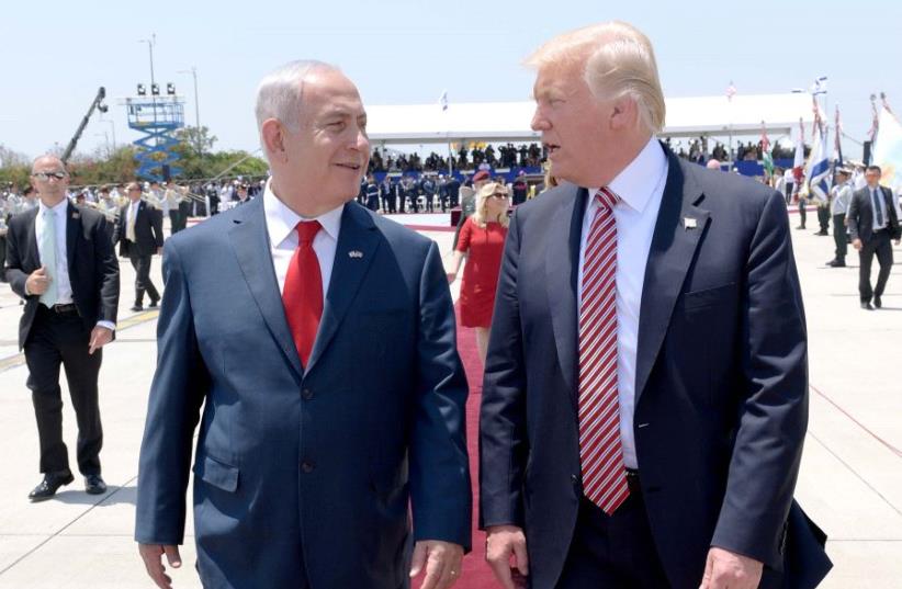 US President Donald Trump and PM Netanyahu at Ben Gurion airport (photo credit: AVI OHAYON - GPO)