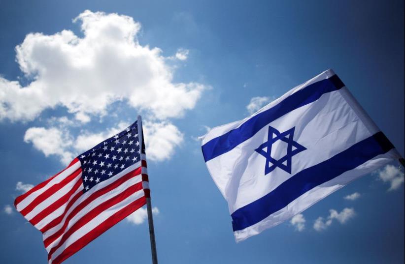 American and Israeli flags (photo credit: REUTERS)