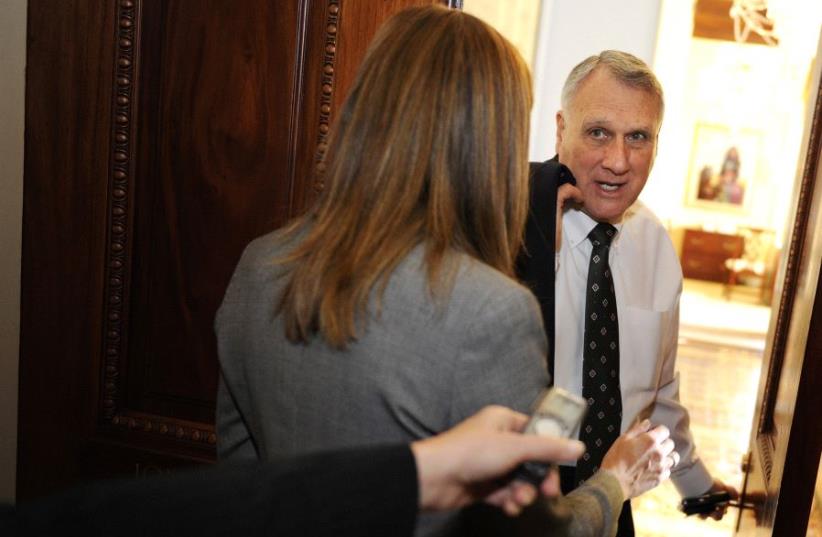Senate Minority Whip Jon Kyl (R-AZ) talks to reporters as he walks to his office after meeting with Minority Leader Mitch McConnell (not pictured) at the U.S. Capitol in Washington, December 21, 2010 (photo credit: JONATHAN ERNST / REUTERS)
