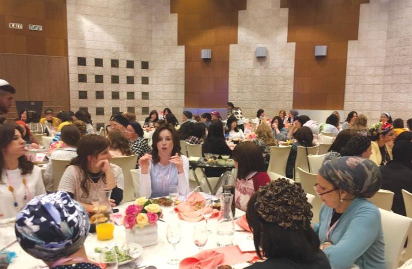 ULTRA-ORTHODOX WOMEN network at the Jerusalem International Convention Center yesterday (photo credit: TEMECH)