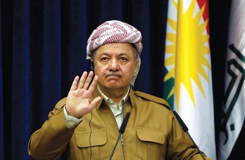 KURDISTAN REGIONAL Government President Masoud Barzani gestures during a news conference in Erbil, Iraq, in April.  (photo credit: AZAD LASHKARI / REUTERS)