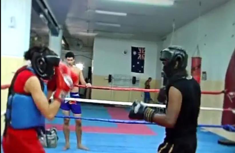 Thai Boxer Nili Block competing in the ring  (photo credit: SCREENSHOT DOSTORIES 365)