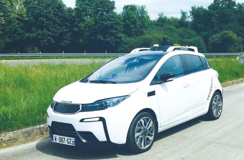 VEDECOM’S AUTONOMOUS VEHICLE is designed to detect ground markings, recognize signs and adjust speed according to traffic signals, road obstacles and other vehicles. (photo credit: VEDECOM)