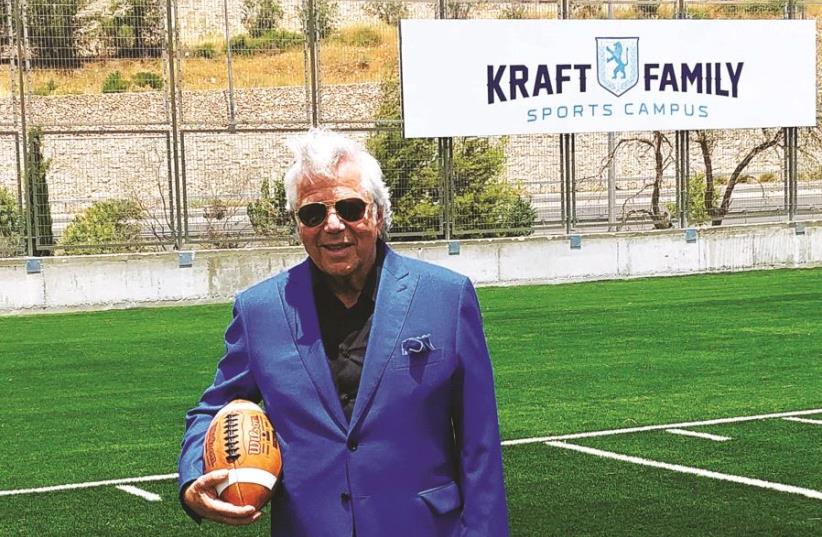 Robert Kraft poses on the 30-yard-line of the regulation-size football field at the newly inaugurated Kraft Family Sports Campus in Jerusalem. The New England Patriots owner wrapped up his star-studded Touchdown Israel II trip yesterday. (photo credit: URIEL STURM)