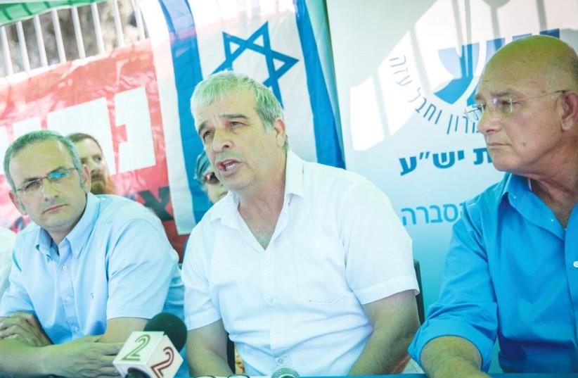 YESHA COUNCIL HEAD Avi Ro’eh speaks during a press conference at the protest tent of Beit El residents in Jerusalem yesterday. (photo credit: YONATAN SINDEL/FLASH 90)