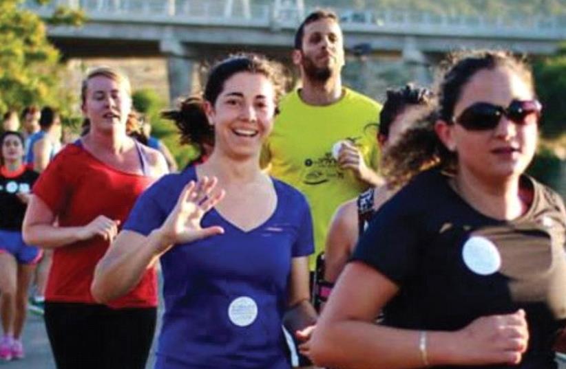 MEMBERS OF Runners Without Borders participate in a race in east Jerusalem in March (photo credit: Courtesy)