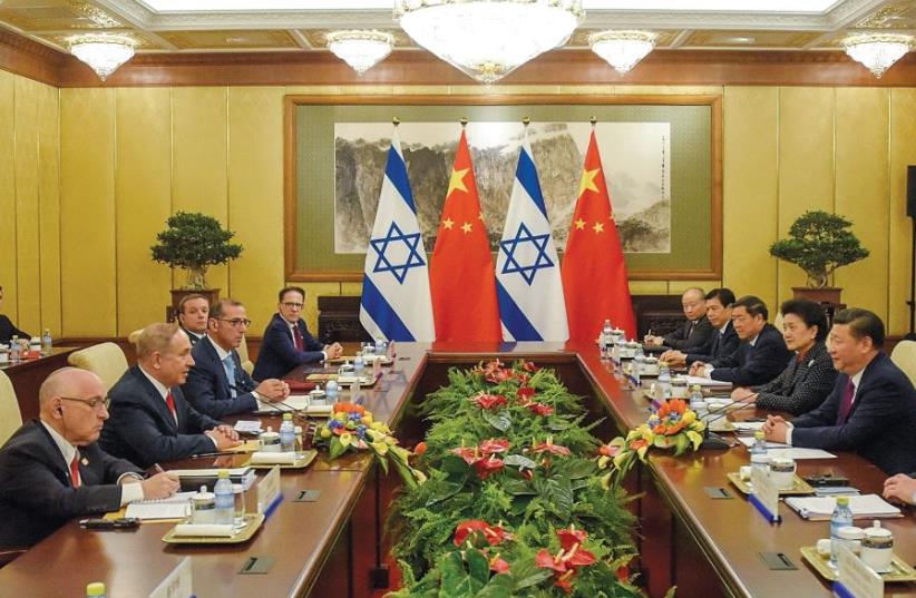 Prime Minister Benjamin Netanyahu meets with Chinese President Xi Jinping in Beijing on March 21 (photo credit: REUTERS)