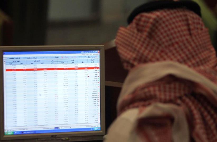 A Saudi man sits at a computer [File] (photo credit: REUTERS)
