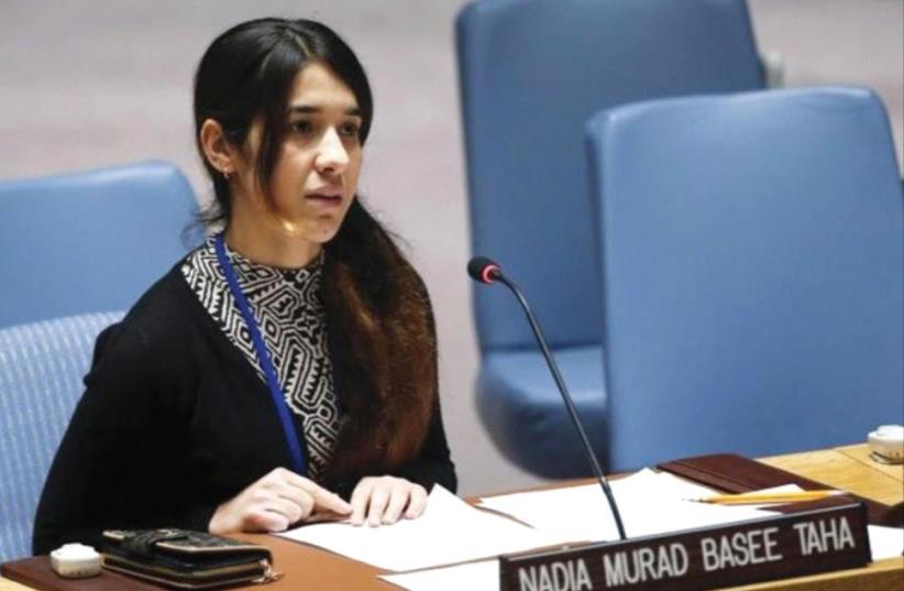 Yazidi human rights activist Nadia Murad speaks to members of the UN Security Council (photo credit: REUTERS)