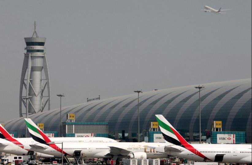 Emirates Airlines aircrafts are seen at Dubai International Airport, United Arab Emirates May 10, 2016 (photo credit: REUTERS)