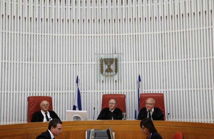 The Supreme Court in Jerusalem hearing a case. (photo credit: REUTERS)