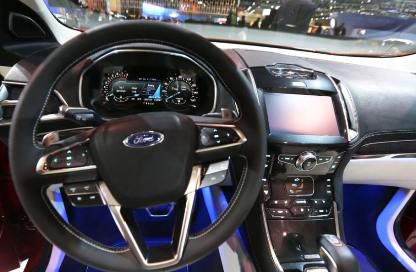 Interior of Ford Edge Concept vehicle is pictured at the 2013 Los Angeles Auto Show in Los Angeles, California November 20, 2013. (photo credit: REUTERS)