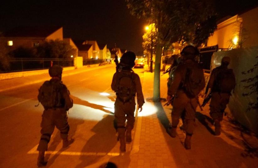 IDF forces in action following deadly attack in Halamish, July 22, 2017. (photo credit: IDF SPOKESPERSON'S UNIT)