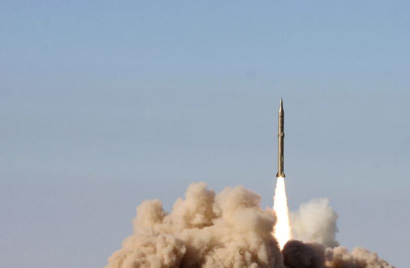 Rocket launch in Iran (photo credit: FARS)