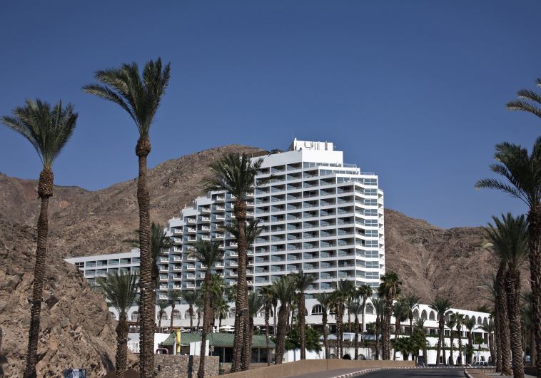 A hotel is seen against a backdrop of mountains in the Red Sea resort of Eilat [Illustrative]