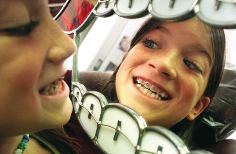 IT IS recommended every child get a check-up with an orthodontist (photo credit: MCT)