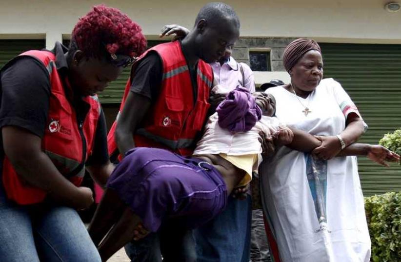 Relative of victim of Thursday's  terror attack in Kenya (photo credit: REUTERS)