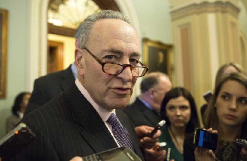 US Senator Charles Schumer (D-NY) speaks to reporters on Capitol Hill in Washington (photo credit: REUTERS)