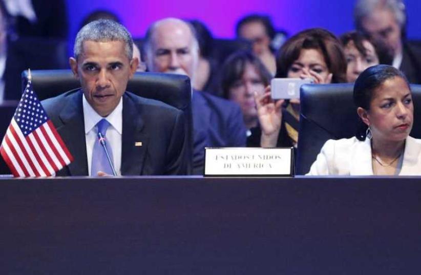 US President Barack Obama (L), flanked by National Security Advisor Susan Rice, pauses during remarks at the Summit of the Americas in Panama City (photo credit: REUTERS)