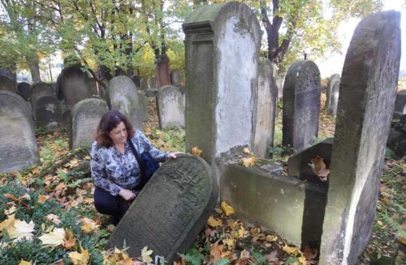 DR. FLORENCE Luxenberg-Eisenberg at a Jewish cemetery in Bochnia, Poland (photo credit: Courtesy)