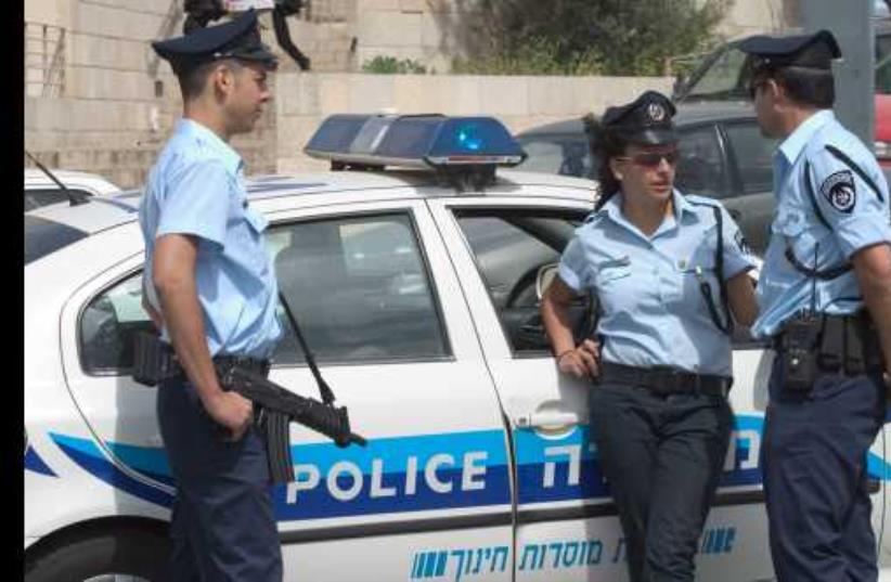 Israel police officers (photo credit: Wikimedia Commons)