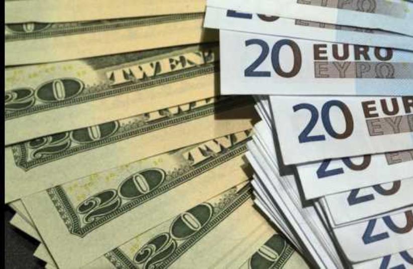 US dollars and euros banknotes are seen in this illustration photo (photo credit: REUTERS)