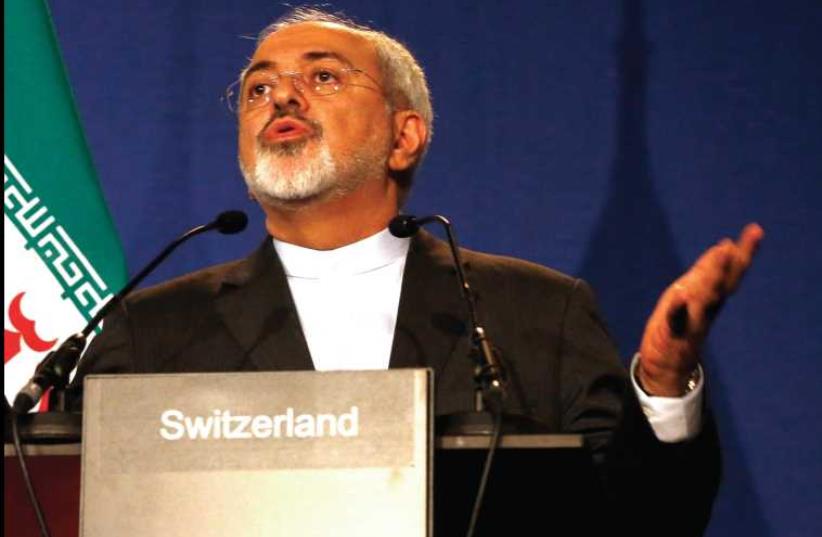 Iran’s Foreign Minister Mohammad Javad Zarif presents Tehran’s case in Lausanne, on April 2. (photo credit: JONATHAN ERNST / REUTERS)