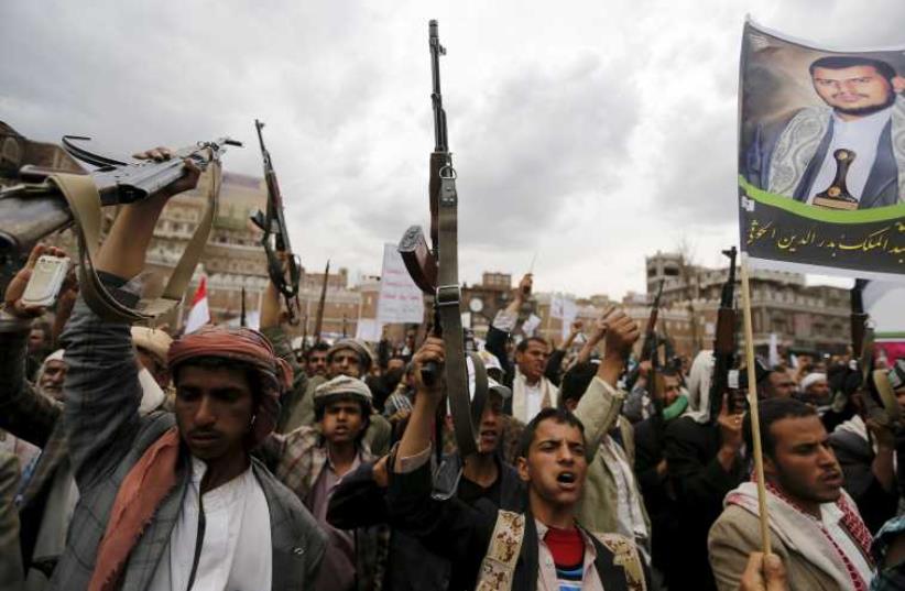 Houthi Shi’ite rebels hold a mass protest in the Yemeni capital Sana’a, March 26. (photo credit: JONATHAN ERNST / REUTERS)