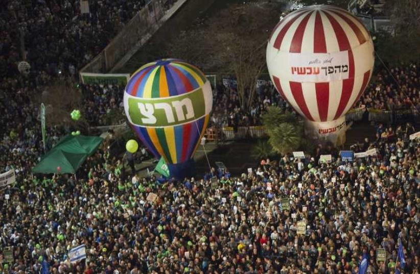 Labor pre-election rally in Tel Aviv (photo credit: AMIR COHEN - REUTERS)