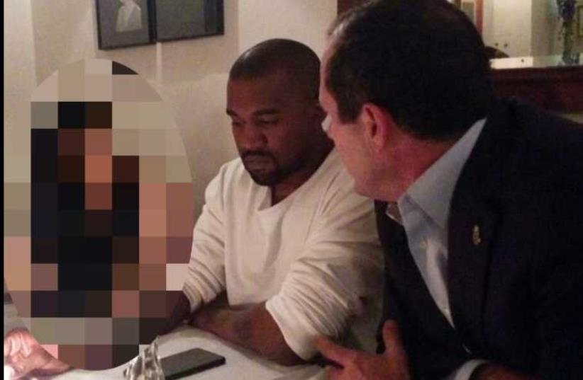 The blurred photo of Kim Kardashian, Kanye West and Jerusalem Mayor Nir Barkat, similar to how it appeared on the Kikar Shabbat website (photo credit: FACEBOOK,JPOST STAFF)