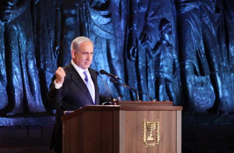 Netanyahu speaks during Holocaust Remembrance Day memorial ceremony at Yad Vashem, (photo credit: MARC ISRAEL SELLEM/THE JERUSALEM POST)