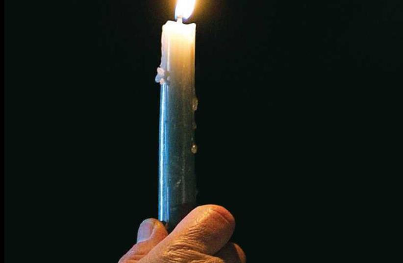 Candle (photo credit: REUTERS)
