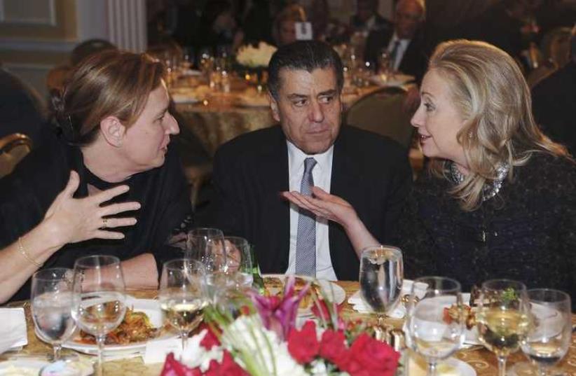From left: Tzipi Livni, Haim Saban, and Hillary Clinton (photo credit: REUTERS)