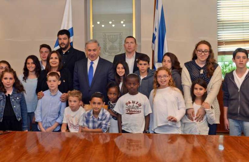 PM Netanyahu meets with IDF orphans (photo credit: GPO)