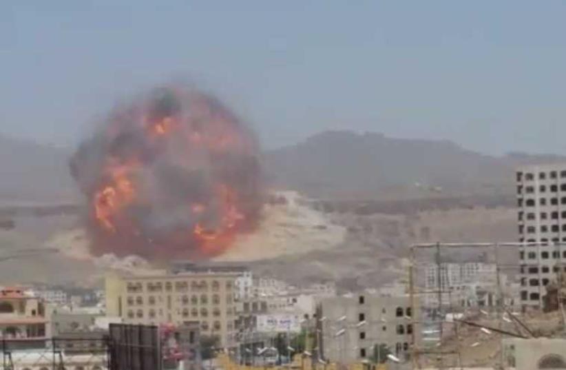 Camera films moment of biggest blast in weeks in Sanaa. (photo credit: screenshot)