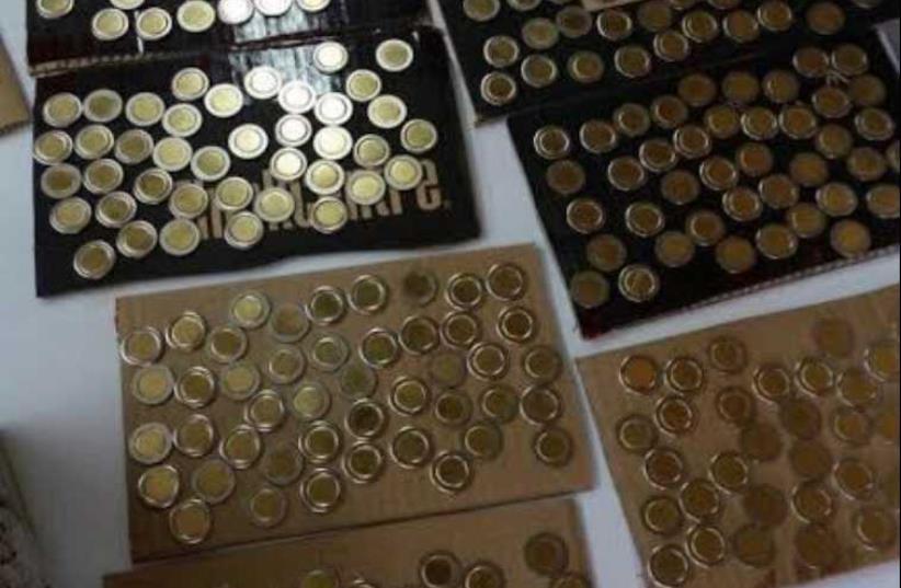 Counterfeit coins (photo credit: POLICE SPOKESPERSON'S UNIT)