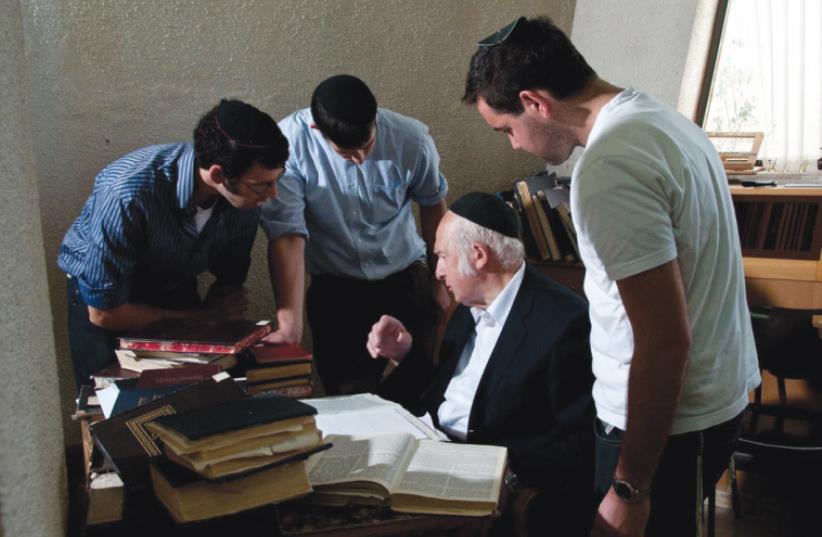 Yeshivat Har Etzion students study with Rabbi Aharon Lichtenstein in this file photo (photo credit: COURTESY YESHIVAT HAR ETZION)