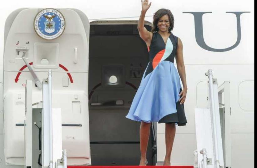 Michelle Obama fashion choices have drawn both admiration and criticism. (photo credit: REUTERS)