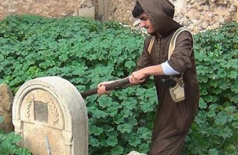 ISIS destroys gravestones in Mosul (photo credit: MEMRI)