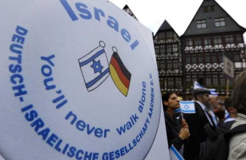 Protesters attend a rally against anti-Semitism in Frankfurt (photo credit: REUTERS)