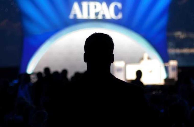 A man waits for the start of the evening's speeches at the American Israel Public Affairs Committee (AIPAC) policy conference in Washington (photo credit: REUTERS)